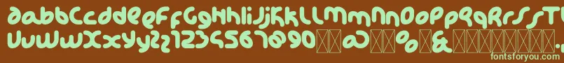 フォントKdhappiRegular – 緑色の文字が茶色の背景にあります。