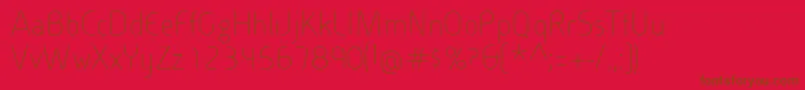 フォントCineplexLtLight – 赤い背景に茶色の文字