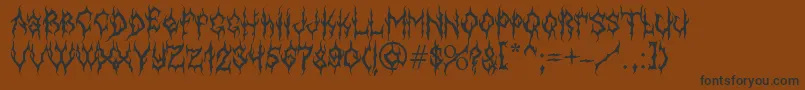 MbGothicdawnFont-Schriftart – Schwarze Schriften auf braunem Hintergrund