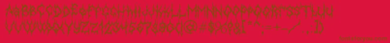 Fonte MbGothicdawnFont – fontes marrons em um fundo vermelho