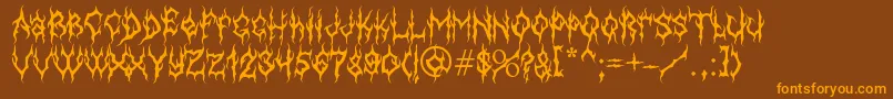Więcej informacji o czcionce MbGothicdawnFont Czcionka MbGothicdawnFont – pomarańczowe czcionki na brązowym tle