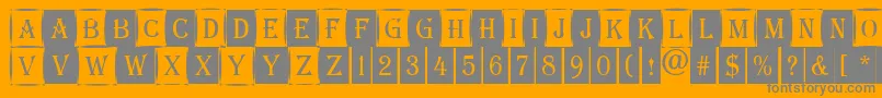 AAlgeriuscmdc1cmb-Schriftart – Graue Schriften auf orangefarbenem Hintergrund