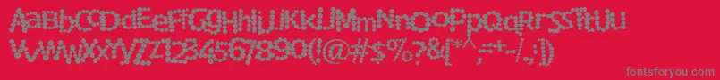 RockyMountainSpottedFever-Schriftart – Graue Schriften auf rotem Hintergrund