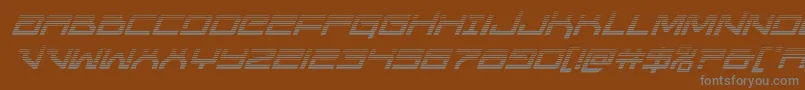 Unitedplanetsgradital-fontti – harmaat kirjasimet ruskealla taustalla