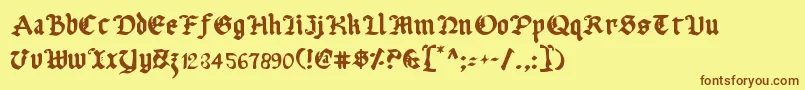 フォントUberv2 – 茶色の文字が黄色の背景にあります。