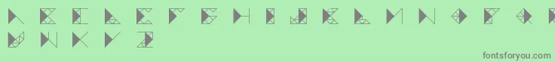 Trianglefutura-fontti – harmaat kirjasimet vihreällä taustalla