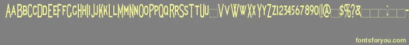 フォントLewishamcondensed – 黄色のフォント、灰色の背景