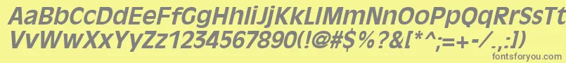 OliviaantiqueBoldItalic-Schriftart – Graue Schriften auf gelbem Hintergrund