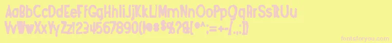 Angosturaink-fontti – vaaleanpunaiset fontit keltaisella taustalla