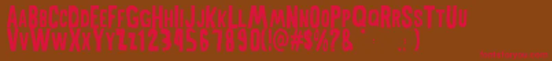 フォントMiddlewomanRegular – 赤い文字が茶色の背景にあります。