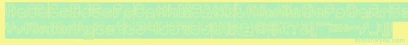 DragonFlyOutlinedHollow Font – Green Fonts on Yellow Background