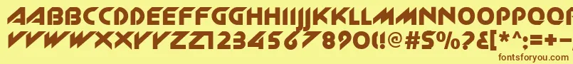 フォントNewzelek – 茶色の文字が黄色の背景にあります。