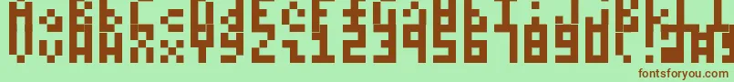 Itty Font – Brown Fonts on Green Background
