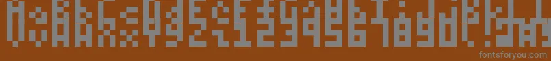 フォントItty – 茶色の背景に灰色の文字