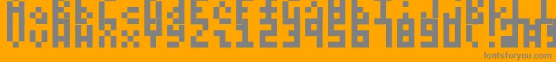 フォントItty – オレンジの背景に灰色の文字
