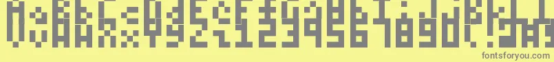 Itty Font – Gray Fonts on Yellow Background