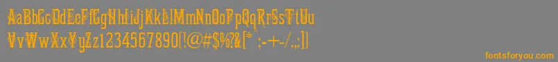 フォントMartaDecorTwo – オレンジの文字は灰色の背景にあります。