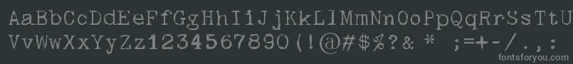 Шрифт Skulltypewr00 – серые шрифты на чёрном фоне