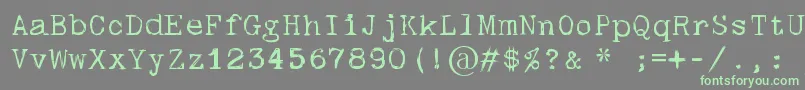 フォントSkulltypewr00 – 灰色の背景に緑のフォント