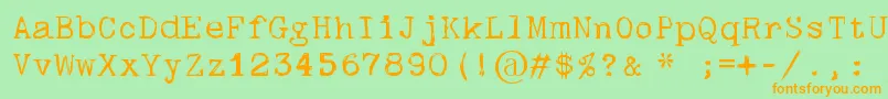 フォントSkulltypewr00 – オレンジの文字が緑の背景にあります。