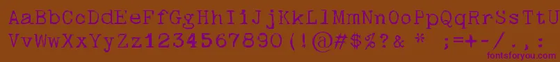 Skulltypewr00-fontti – violetit fontit ruskealla taustalla