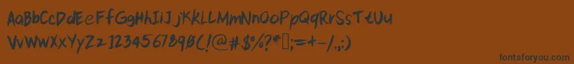 Шрифт Kittypeextra – чёрные шрифты на коричневом фоне