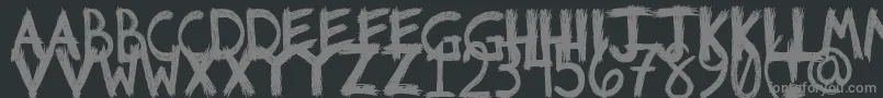 フォントRiotfont1 – 黒い背景に灰色の文字