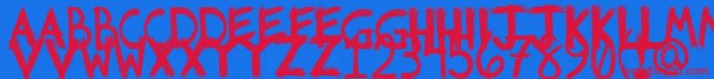 Riotfont1-Schriftart – Rote Schriften auf blauem Hintergrund