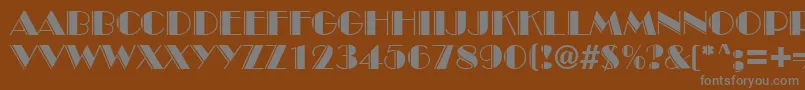 Fonte BroadwayengravedRegularDb – fontes cinzas em um fundo marrom