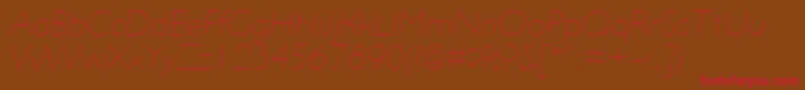 UltimapdadUltralightitalic Font – Red Fonts on Brown Background