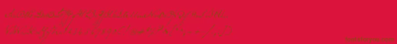 Schoonerscript-fontti – ruskeat fontit punaisella taustalla