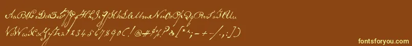 Schoonerscript Font – Yellow Fonts on Brown Background
