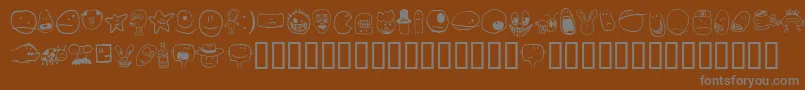 TombatsSmilies Font – Gray Fonts on Brown Background