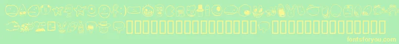 TombatsSmilies Font – Yellow Fonts on Green Background