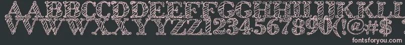 Zsynorebo Font – Pink Fonts on Black Background