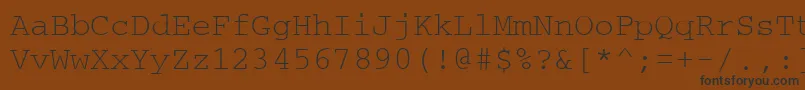 Шрифт Couriertm – чёрные шрифты на коричневом фоне