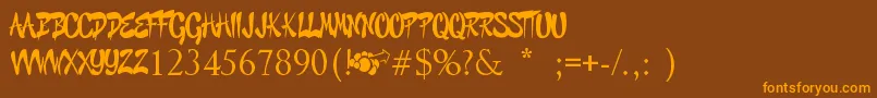 Шрифт GraffitiCheecksStyle – оранжевые шрифты на коричневом фоне
