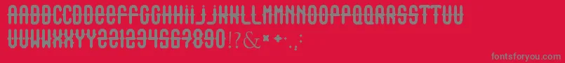 Outasight-Schriftart – Graue Schriften auf rotem Hintergrund