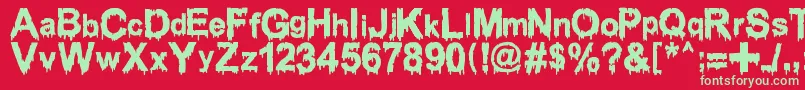 WoodcutterDrippingClassicFont Font – Green Fonts on Red Background