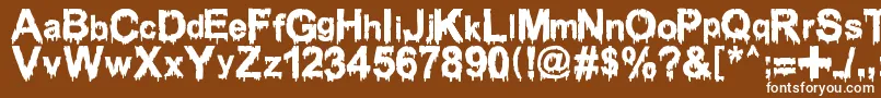 Шрифт WoodcutterDrippingClassicFont – белые шрифты на коричневом фоне