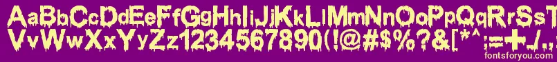 Fonte WoodcutterDrippingClassicFont – fontes amarelas em um fundo roxo