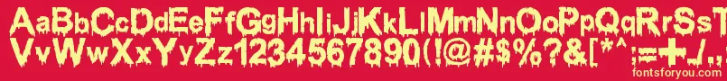 Шрифт WoodcutterDrippingClassicFont – жёлтые шрифты на красном фоне