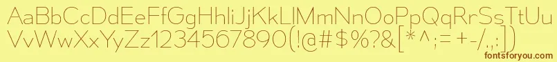 Czcionka MesmerizeUl – brązowe czcionki na żółtym tle