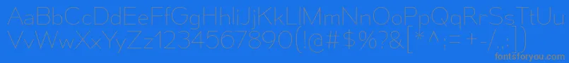 MesmerizeUl-fontti – harmaat kirjasimet sinisellä taustalla