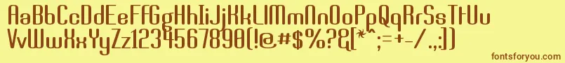 フォントBrassi – 茶色の文字が黄色の背景にあります。