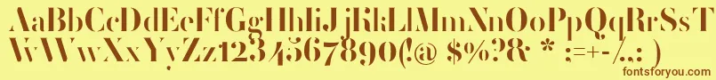 フォントFemoralisRegular – 茶色の文字が黄色の背景にあります。