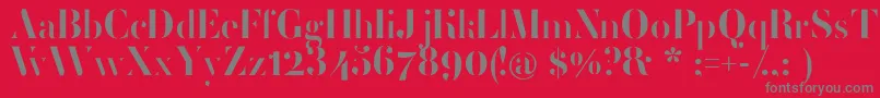 フォントFemoralisRegular – 赤い背景に灰色の文字
