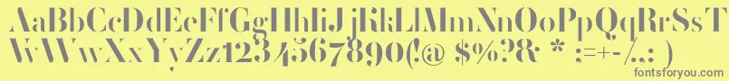 フォントFemoralisRegular – 黄色の背景に灰色の文字