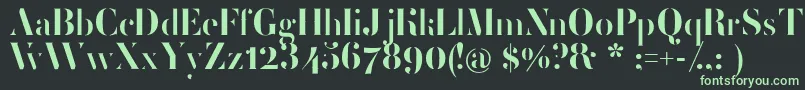 フォントFemoralisRegular – 黒い背景に緑の文字