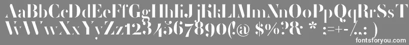 フォントFemoralisRegular – 灰色の背景に白い文字